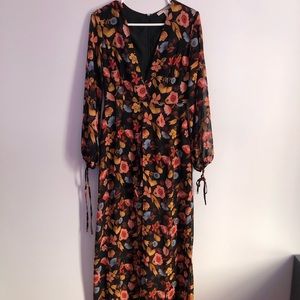Dress-romper with flower patterns